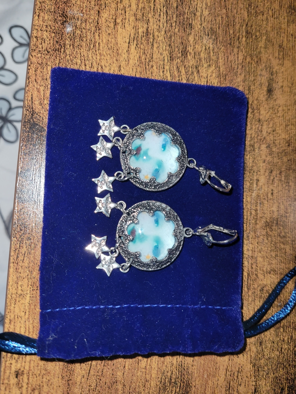 Silver Star Dangle Earrings with Aqua Resin Inlay